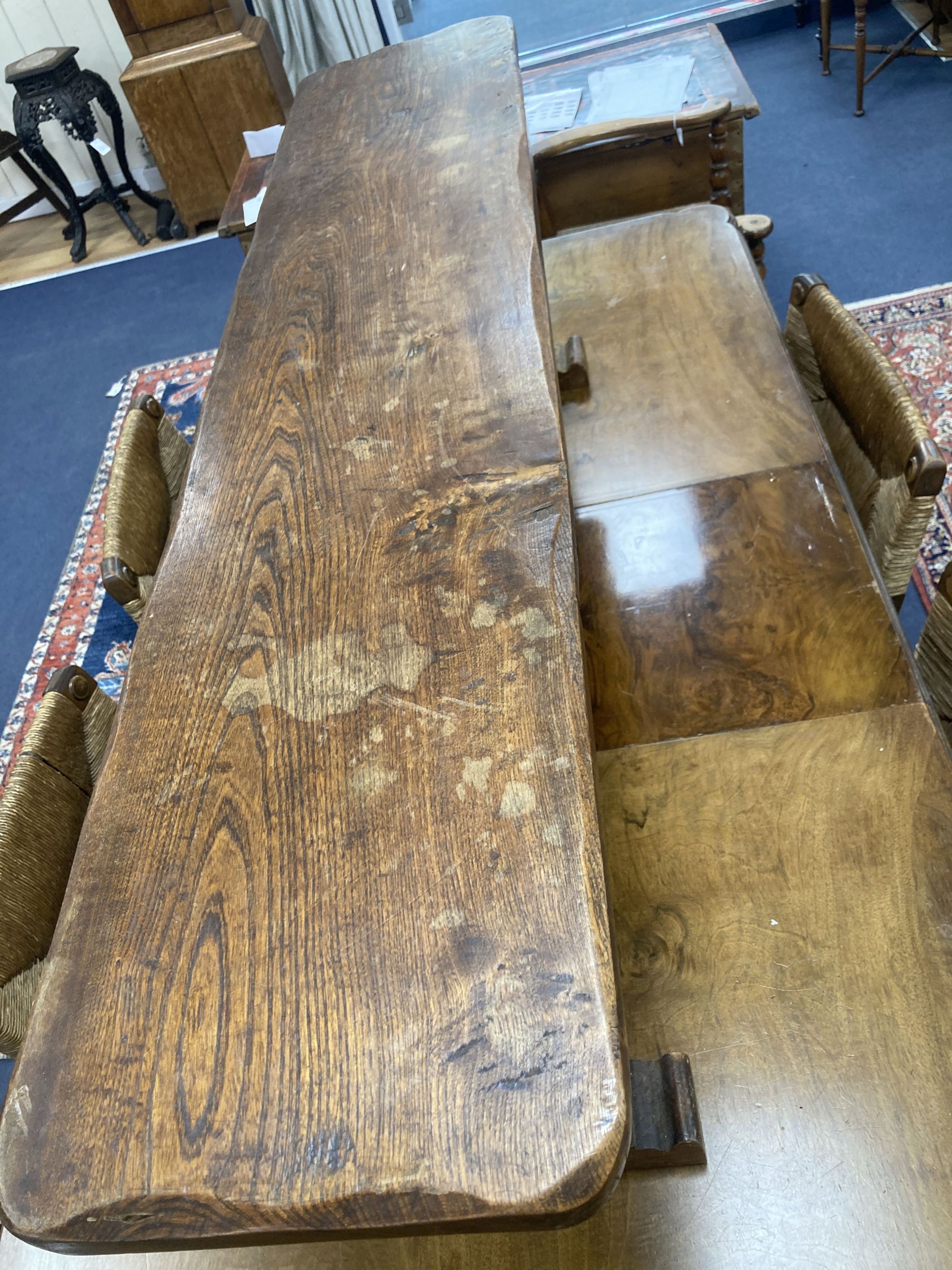 A 17th century style oak bench, length 138cm, depth 29cm, height 44cm